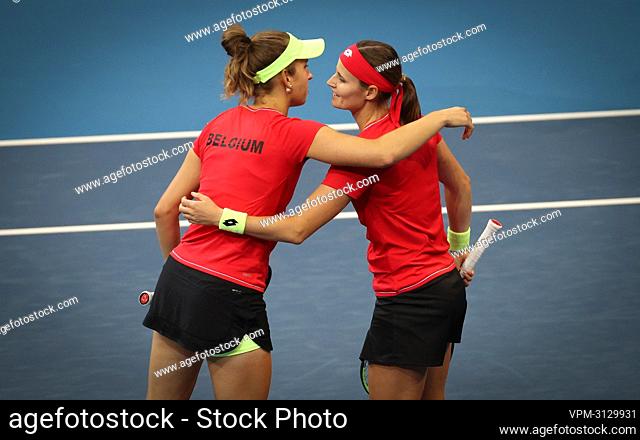 Belgian Elise Mertens and Belgian Greet Minnen celebrate after winning the third and last meeting against Australian pair Perez-Sanders at the second match...