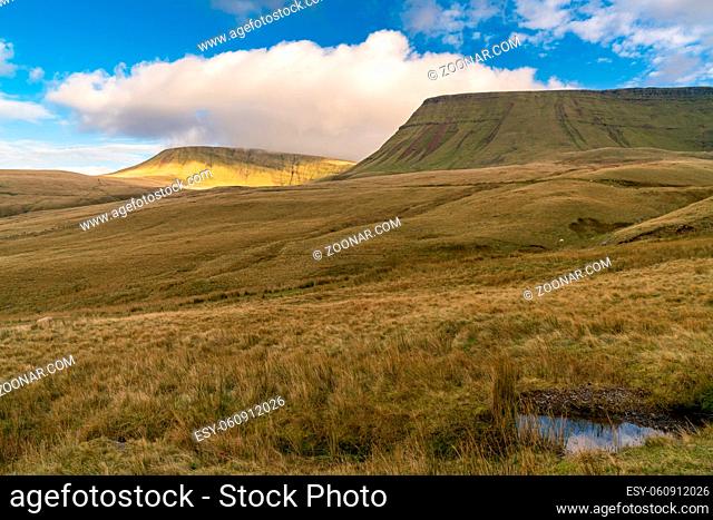 Clouds over the Bannau Sir Gaer (Picws Du) in the Carmarthen Fans in Carmarthenshire, Dyfed, Wales, UK