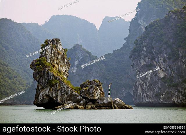 Odd-shaped limestone rock in Ha Long Bay, Vietnam