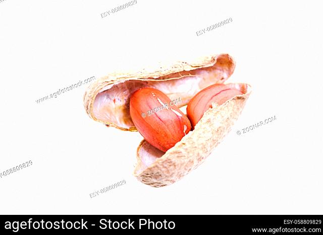 isolated on a white background broken peanuts