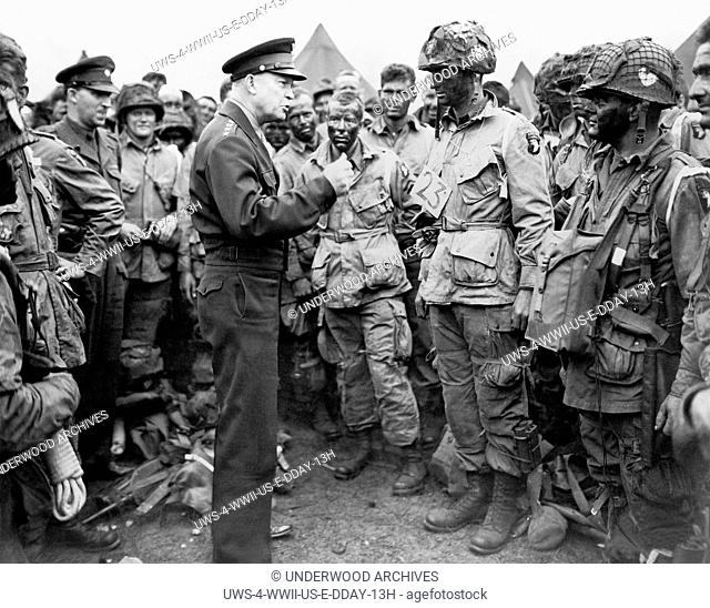 Berkshire, England: June 5, 1944.General Dwight D. Eisenhower talking with American paratroopers on the evening of June 5, 1944
