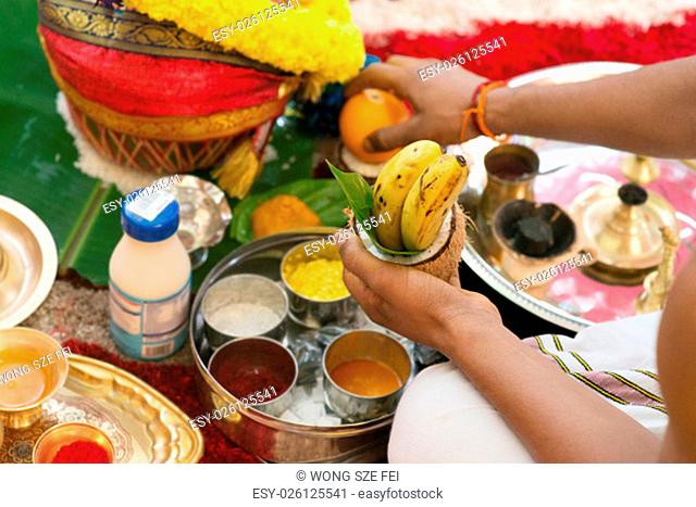 Traditional Indian Hindu religious praying items in ear piercing ceremony for children. Focus on the bananas. India special rituals heritage