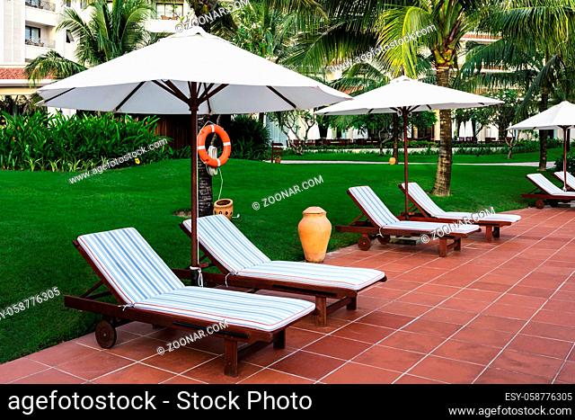 Sun beds on the hotel near pool