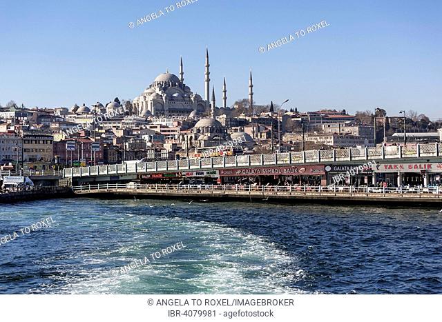 Two-storeyd Galata Bridge over the Golden Horn, behind New Mosque and Suleymaniye Mosque, European side, Istanbul, Turkey