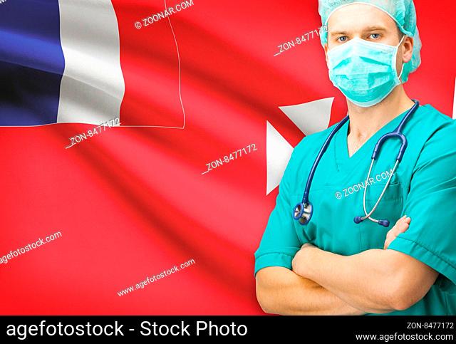 Surgeon with national flag on background - Wallis and Futuna