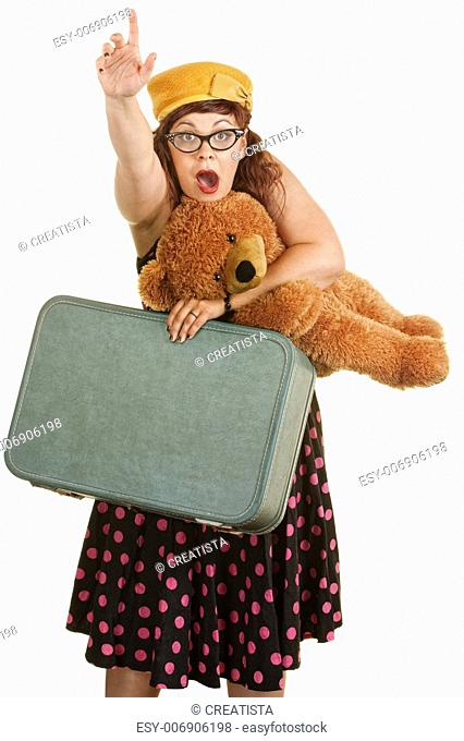 Retro style woman waving hand with suitcase and teddy bear