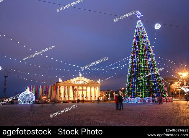 City Christmas illuminations like a large ball Christmas decorations in town Oktyabrskaya Square in central Minsk, Belarus