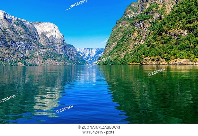 Tourism and travel. Mountains and fjord in Norway
