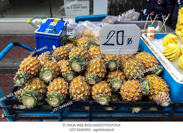 Fruitstall selling pineapples at Yaowarat Bangkok Chinatown, Thailand