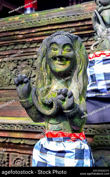 Old statue in Hindu temple in Sacred Monkey Forest, Ubud, Bali, Indonesia