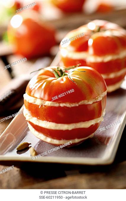 Tomatoes with sea spider stuffing
