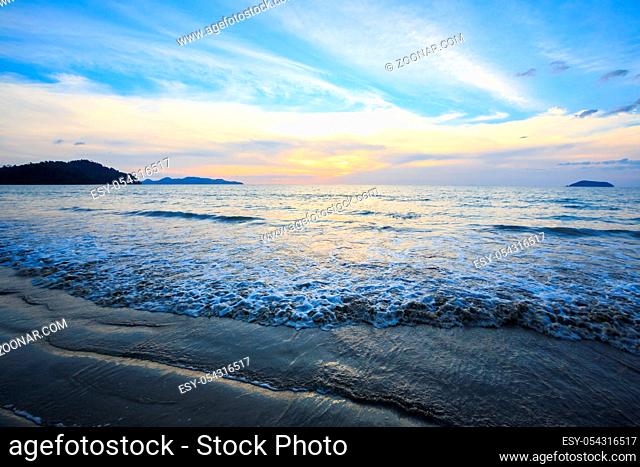 Sunset at Andaman Beach coast in Surin Island National Park Phuket Thailand