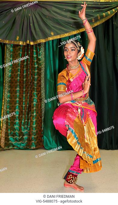 CANADA, BRAMPTON, 03.08.2015, Tamil Hindu girl performs a classical Bharatnatyam dance honoring Lord Shiva during the inauguration of the Sri Sivasubramaniya...