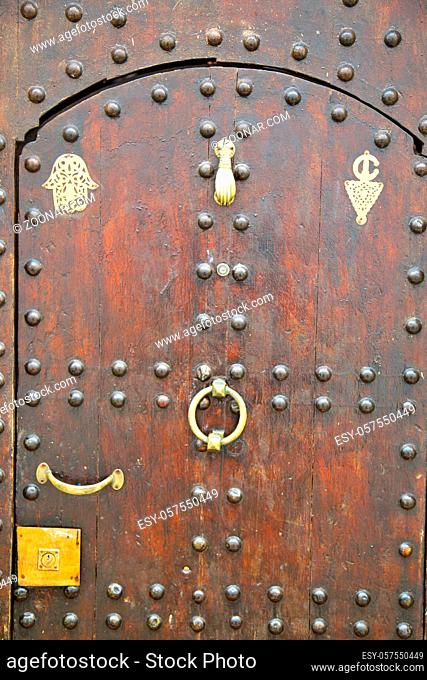 historical in antique building door morocco style africa  wood and metal rusty