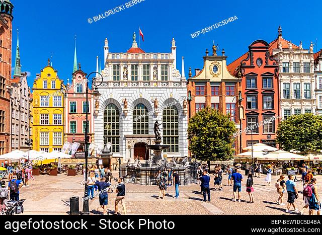 Gdansk, Pomerania / Poland - 2020/07/14: Panoramic view of Long Market - Dlugi Rynek - boulevard in old town city center with Neptune Fountain and Artus Court