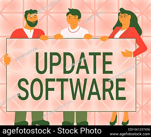 Text caption presenting Update Software. Word for replacing program with a newer version of same product Three Colleagues Holding Presentation Board Showing New...