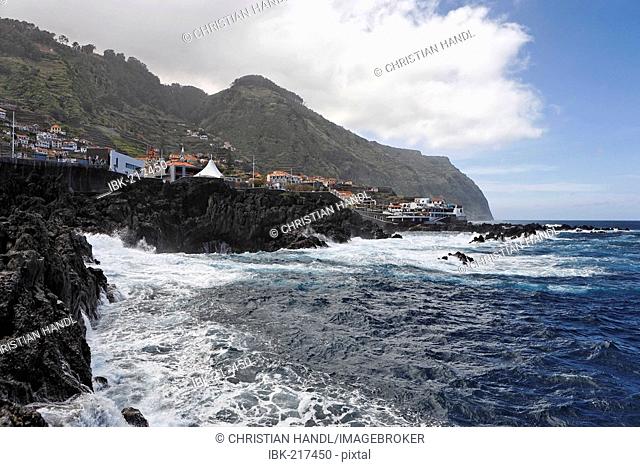A wild and cleft volcanic coast at, Porto Moniz, Madeira, Portugal