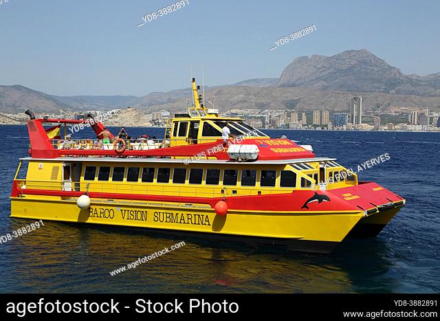 Tourists enjoying the boat with underwater vision in Benidorm, Valencian Community, Spain