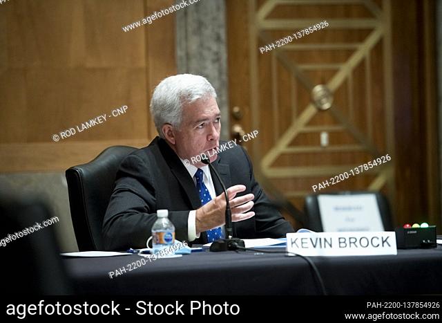 Former Assistant Director for Intelligence Federal Bureau of Investigation Kevin R. Brock responds to questions as he appears before a Senate Committee on...