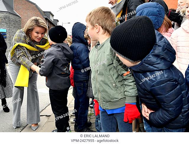 Queen Mathilde of Belgium meets children during a royal visit to the 'Institut du Sacre-Coeur' in Barvaux-sur-Ourthe, for the week of reading aloud