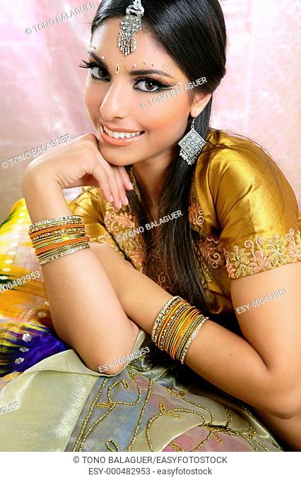 Beautiful indian brunette young woman with traditional fashion