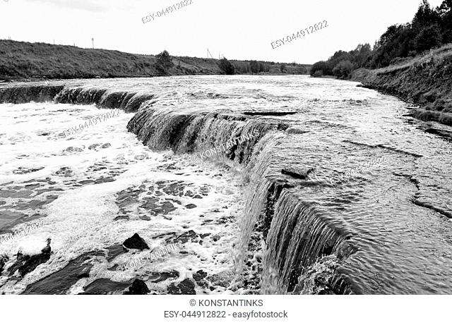 Small waterfall on Tosna River in Leningrad Region, Russia. Black and white