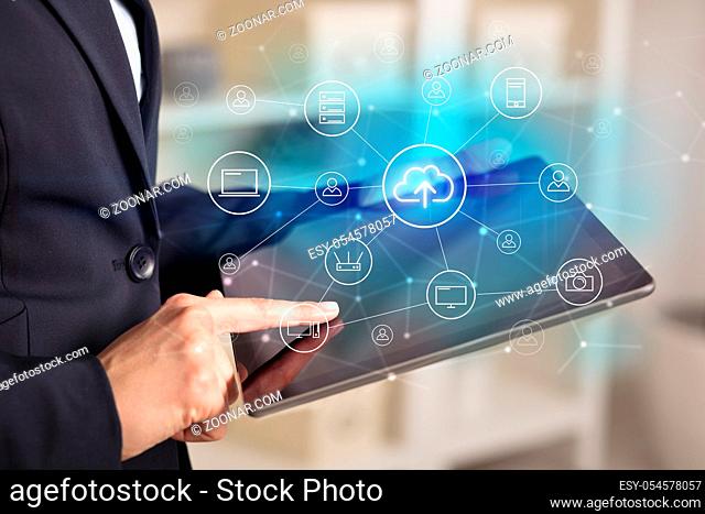 Business woman using tablet with network security and online storage system concept