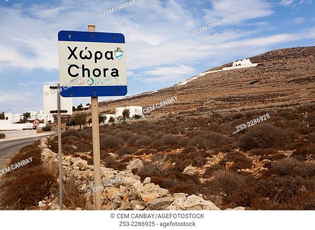 Road leading up to the old town Chora and to the Panagia Kimissis with a sign in the foreground, Folegandros, Cyclades Islands, Greek Islands, Greece, Europe