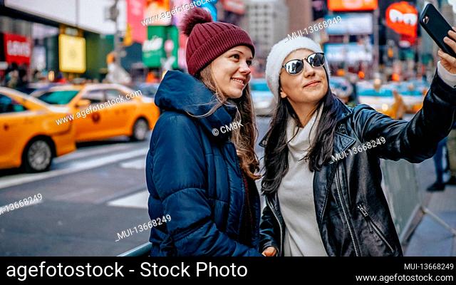 Two friends enjoy their vacation trip to New York - travel photography