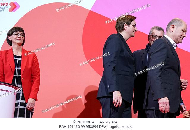 30 November 2019, Berlin: Saskia Esken (SPD, l) stands in the Willy Brandt House after the announcement of the result of the vote on the SPD chairmanship