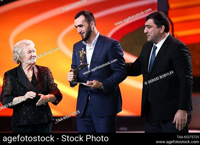 RUSSIA, MOSCOW - NOVEMBER 30, 2023: Russian boxer Muslim Gadzhimagomedov (C), the winner of the Pride of Russia: Best athlete nomination