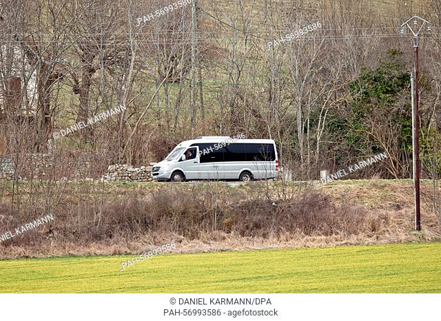 A bus with darkened windows on the road to Seyne Les Alpes, France, 26 March 2015. PHOTO: DANIEL KARMANN/dpa | usage worldwide