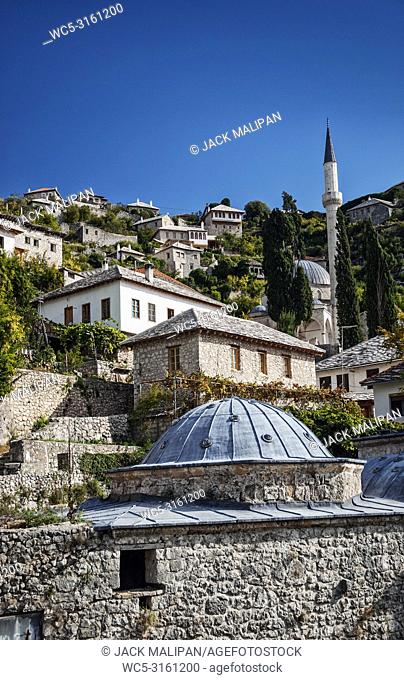 scenic view of pocitelj village traditional old architecture buildings and mosque in Bosnia Herzegovina