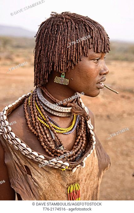 Hamer girl in her village near Turmi in the Omo Valley, Ethiopia