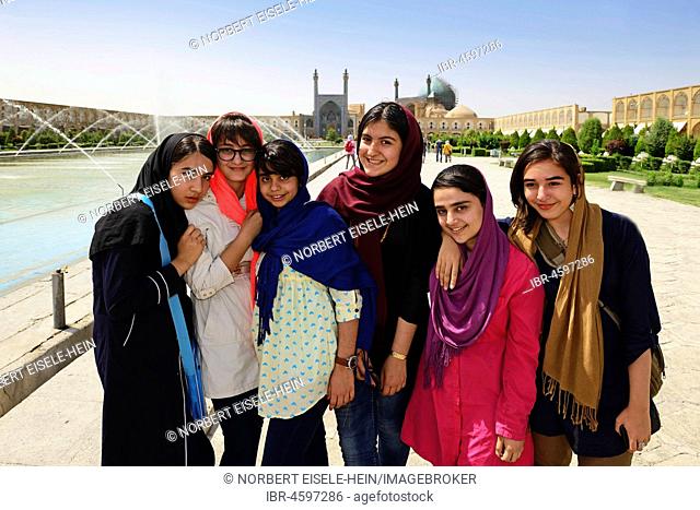 Girls posing on Imam Square, Meydan-e Naqsh-e Jahan, Isfahan, Iran