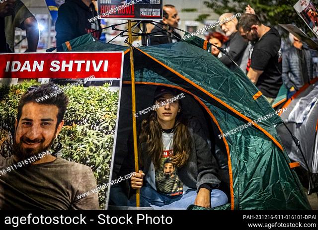 16 December 2023, Israel, Tel Aviv: Israelis and family member of the hostage families protest and build tents outside Kiriya military base calling on Prime...