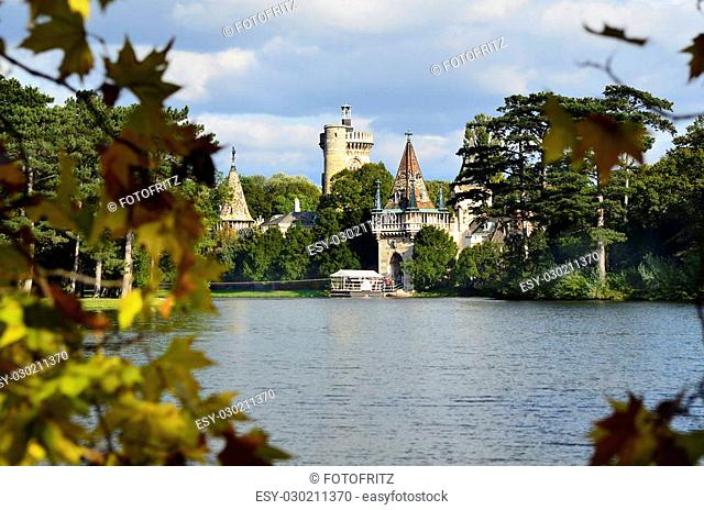 Austria, Castle Franzensburg with lake and ferry boat
