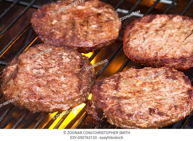 Grilled Burgers on a Barbecue Grill close-up