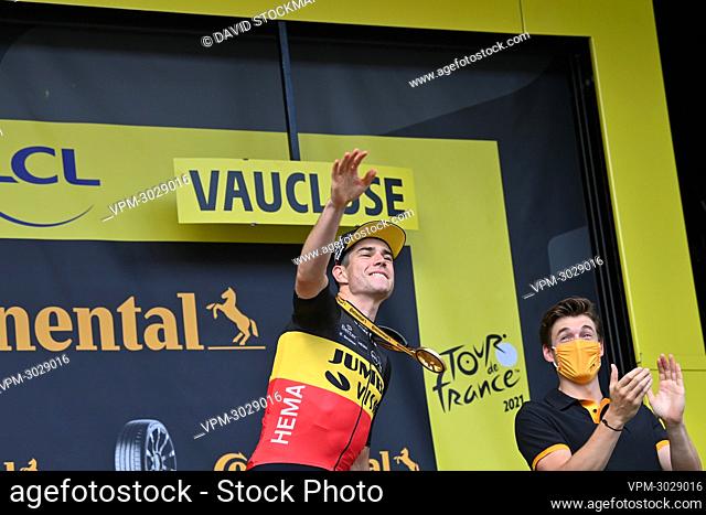 Belgian Wout Van Aert of Team Jumbo-Visma celebrates on the podium after winning stage 11 of the 108th edition of the Tour de France cycling race, 198