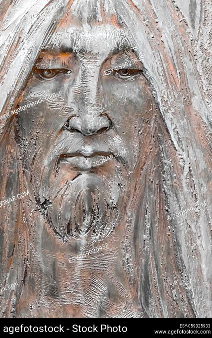 Bronze bas-relief of Jesus. Antique statue of Jesus Christ face. Religion, vintage, faith, history, suffering concept