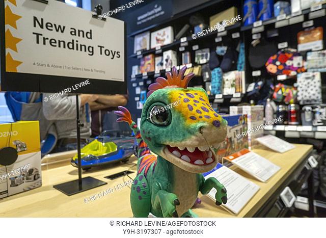 Customers shop and browse in the new Amazon 4-star store in the Soho shopping district in New York on opening day, Thursday, September 27, 2018