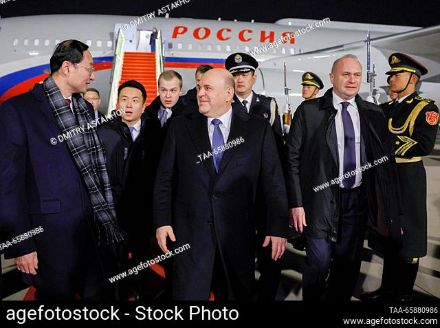 CHINA, BEIJING - DECEMBER 18, 2023: Russia's Prime Minister Mikhail Mishustin (C front) and China's Vice Minister of Foreign Affairs Sun Weidong (L front) are...