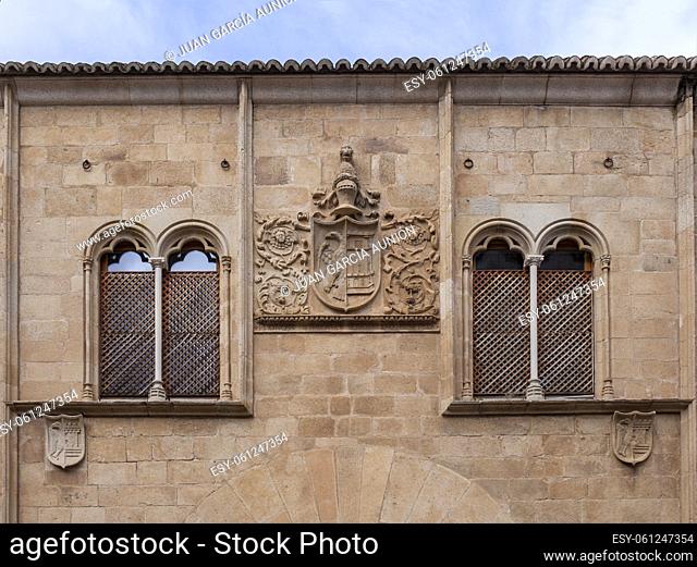 Beautiful mullioned windows at Palace of Mayoralgo. Caceres, Extremadura, Spain