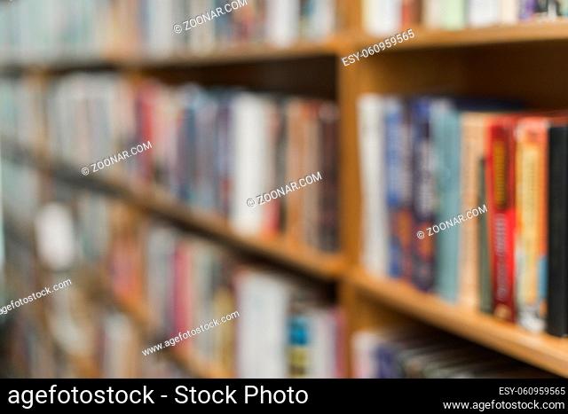 blurred books library shelves