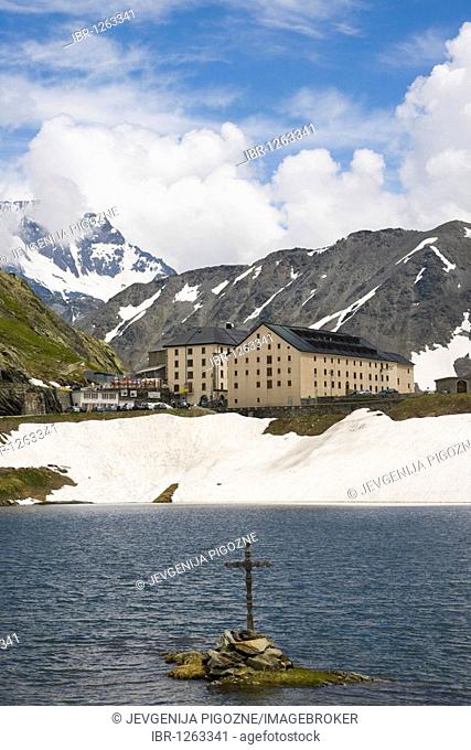View of Hospice du Grand-Saint-Bernard across the lake, Great St Bernard Pass, Col du Grand-Saint-Bernard, Colle del Gran San Bernardo, Western Alps, Italy