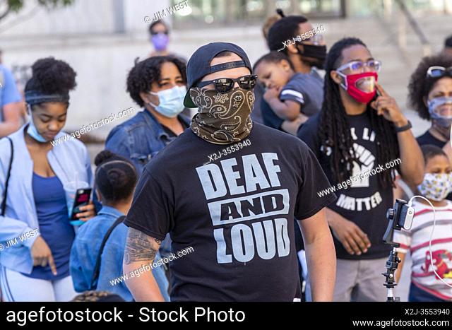 Detroit, Michigan - Deaf people participated in a Black Disabled Lives Matter protest. The protesters asked that police funding be reallocated to mental health...