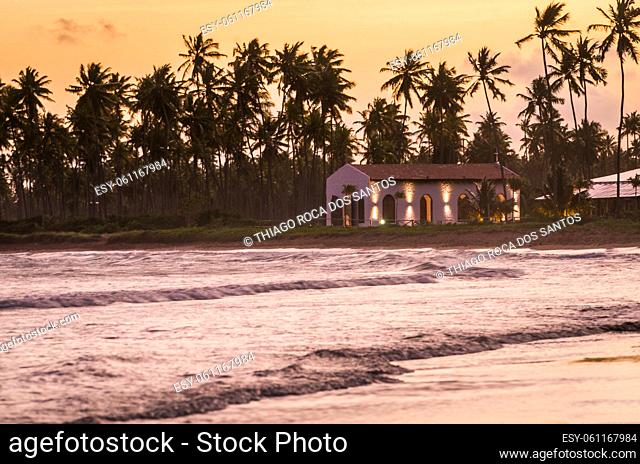 São Miguel dos Milagres, Brazil - November 16, 2019: Beautiful image of the beach of São Miguel dos Milagres with its famous church at sunset