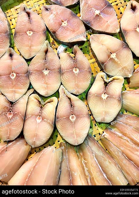 The king mackerels sliced meat on threshing basket for sale