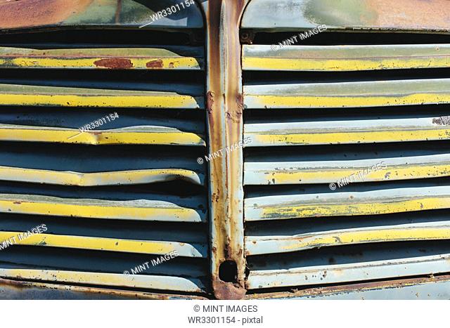 Close up of front grille from abandoned antique truck