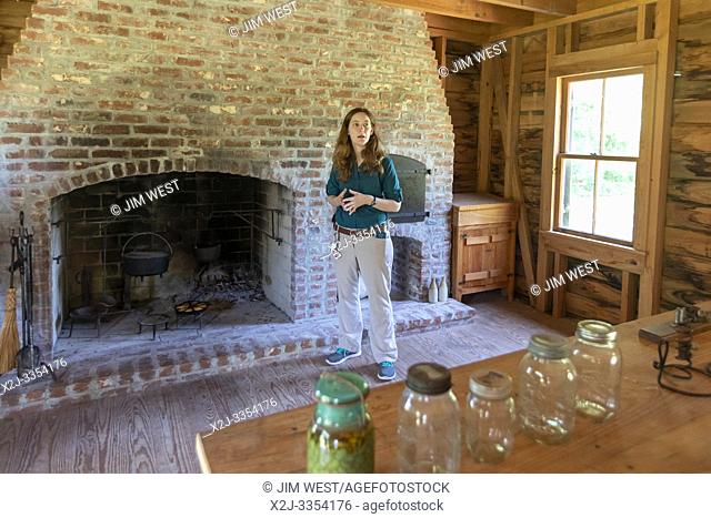 Thibodaux, Louisiana - A tour guide in the reconstructed 19th century kitchen at the E. D. White Historic Site. The site was the home of Edward Douglas White
